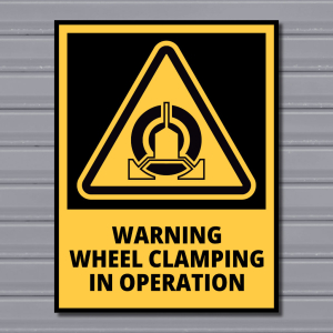 Warning Wheel Clamping in Operation – Hazard Safety Sign
