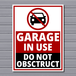 Garage in Use Safety Sign – Do Not Obstruct